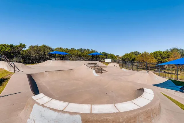 a view of swimming pool with a yard
