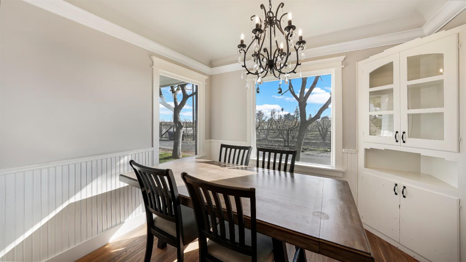 41709 Road 52 Reedley, CA 93654 - Photo 24 of 52 a view of a dining room with furniture window and wooden floor