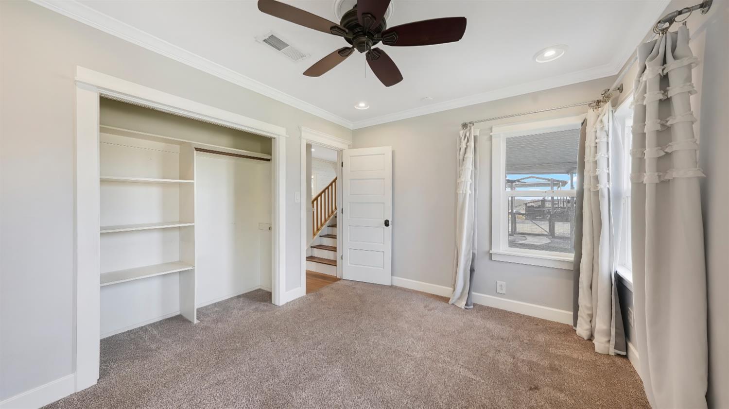41709 Road 52 Reedley, CA 93654 - Photo 32 of 52 a view of an empty room and a ceiling fan