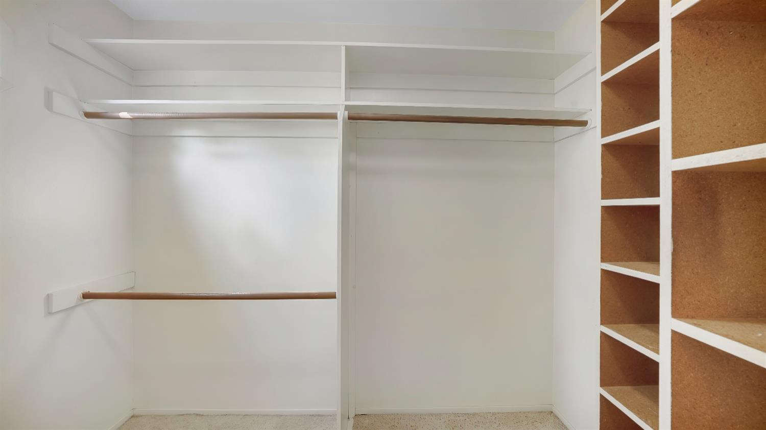 41709 Road 52 Reedley, CA 93654 - Photo 44 of 52 a view of walk in closet with empty racks