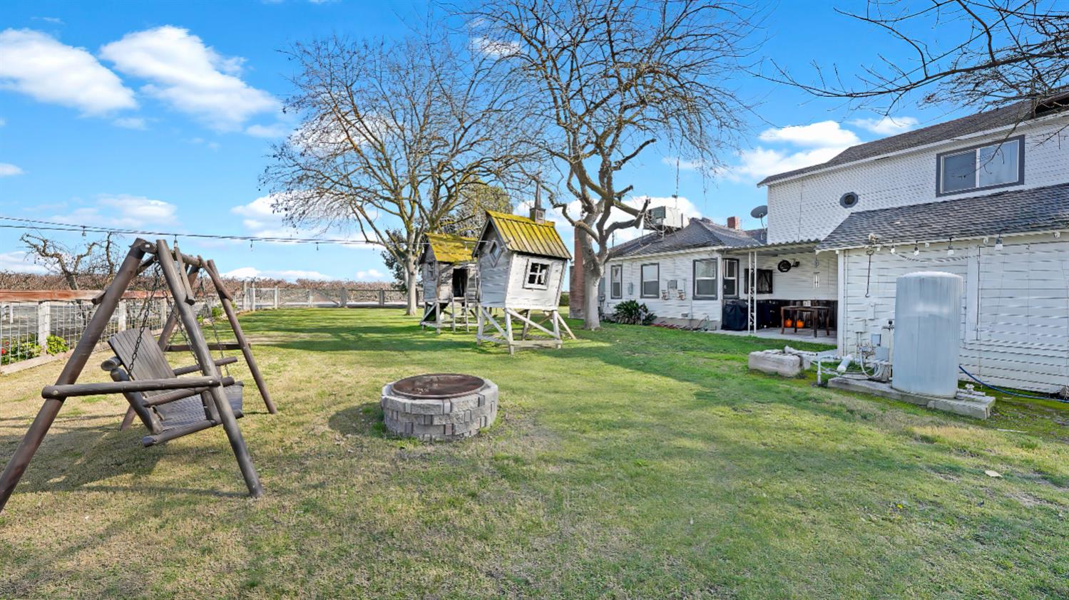 41709 Road 52 Reedley, CA 93654 - Photo 5 of 52 a view of a house with a backyard