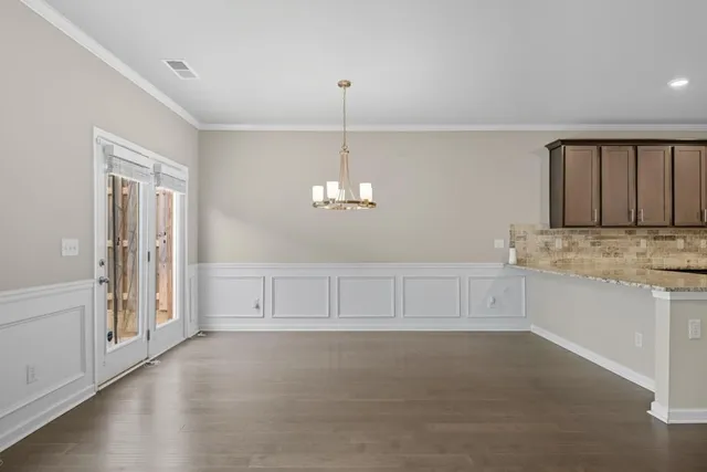 a view of a room with racks on the wall