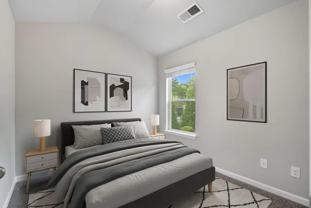 an aerial view of a house with pool