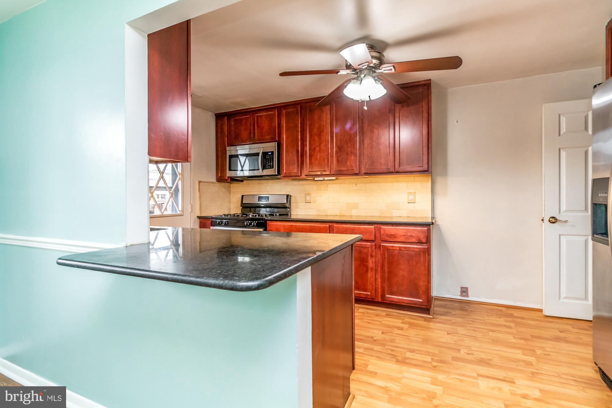7831 Kavanagh Road Baltimore, MD 21222 - Photo 8 of 26 Under Cabinet Lighting