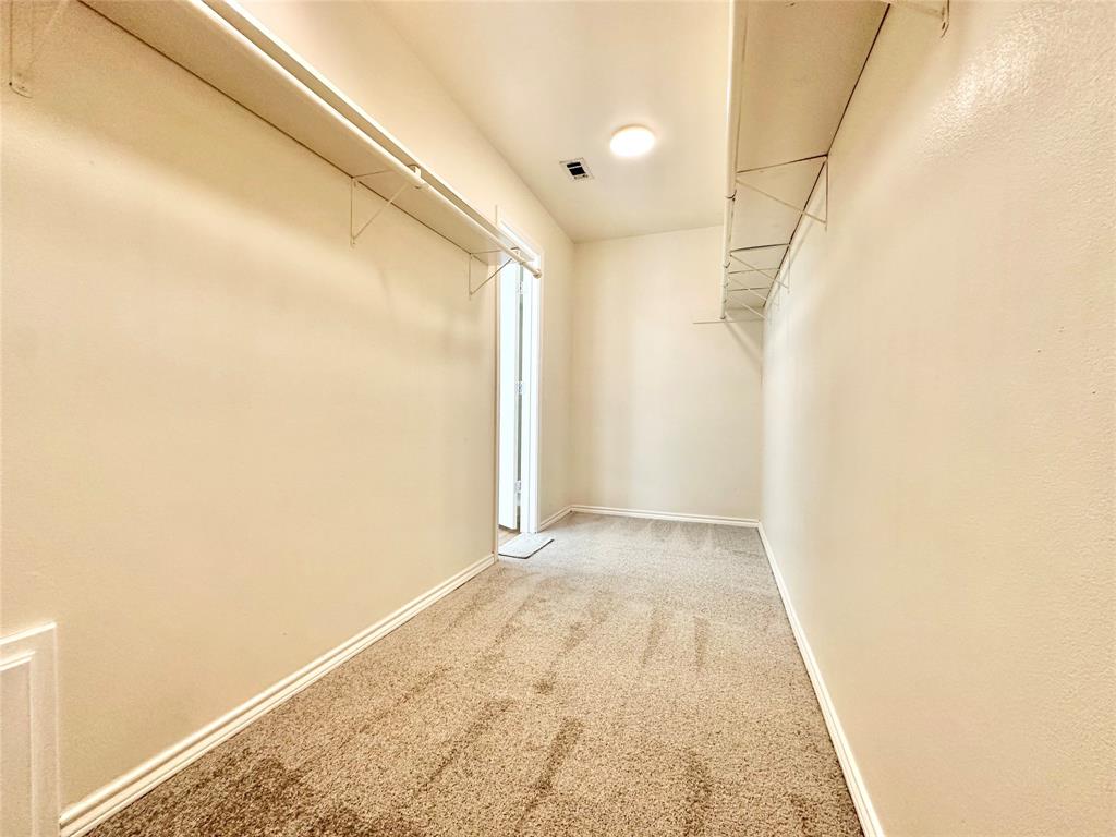 8869 Liberty Road Aubrey, TX 76227 - Photo 15 of 25 a view of hallway with white walls