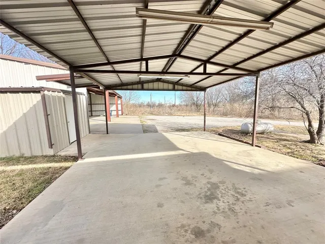a view of a backyard of a house