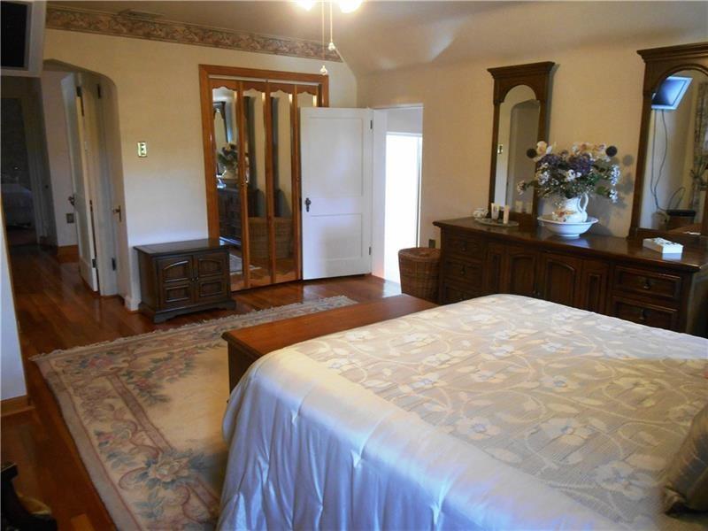 235 Cochran Road Pittsburgh, PA 15228 - Photo 14 of 25 This room has three closets and access to the fourth bedroom and one of the three full baths.