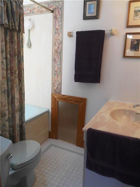 235 Cochran Road Pittsburgh, PA 15228 - Photo 15 of 25 Full bath off of the fourth bedroom. Easy clean surround and a skylight!