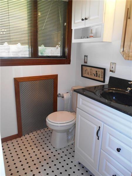 235 Cochran Road Pittsburgh, PA 15228 - Photo 19 of 25 Second floor full bath. Updates throughout and a fabulous black and white checkered tile floor!