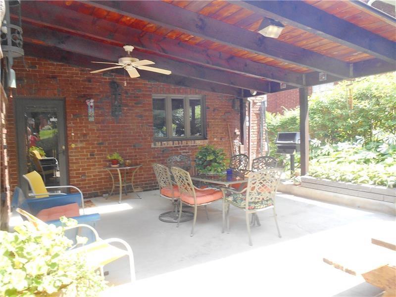 235 Cochran Road Pittsburgh, PA 15228 - Photo 22 of 25 Skylights, ceiling fan, gorgeous brick, a gas grill and there is even a water fountain!!!