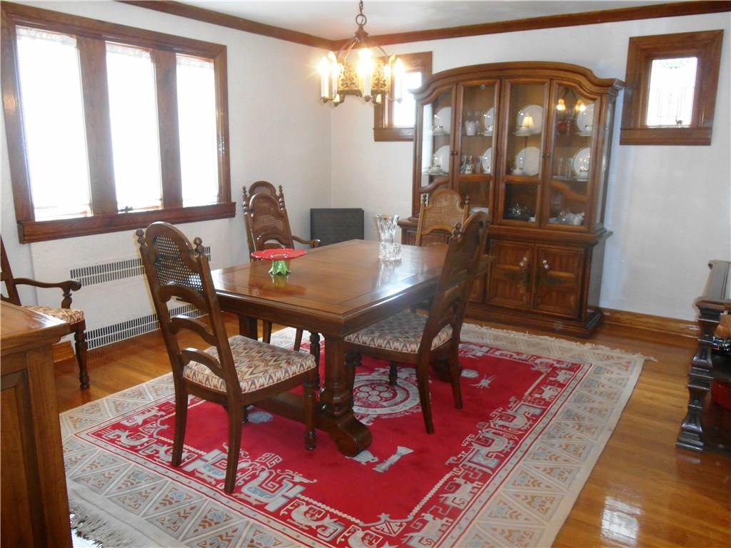 235 Cochran Road Pittsburgh, PA 15228 - Photo 4 of 25 Imagine the dinner parties in this dining room?? Gorgeous lead glass windows and those sparkling floors!!