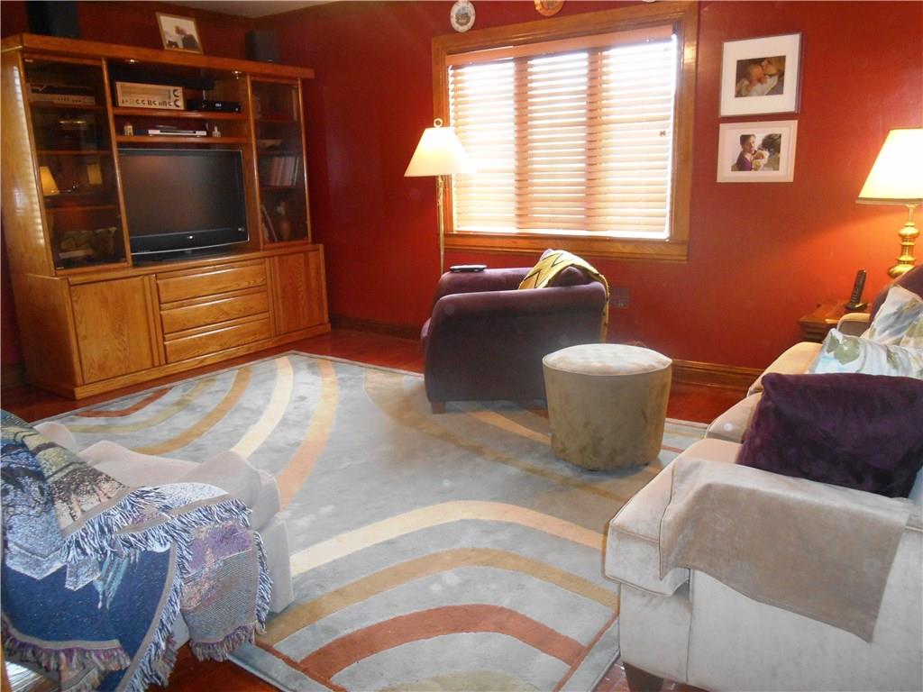 235 Cochran Road Pittsburgh, PA 15228 - Photo 9 of 25 First floor family room. This room has large windows, a ceiling fan and walk in closet.