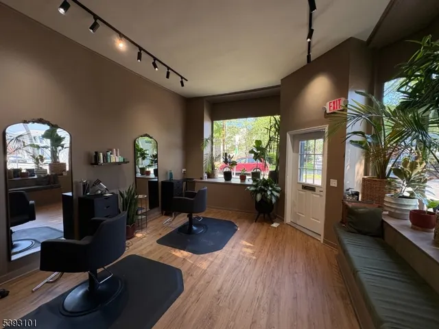 a room with furniture and a large window