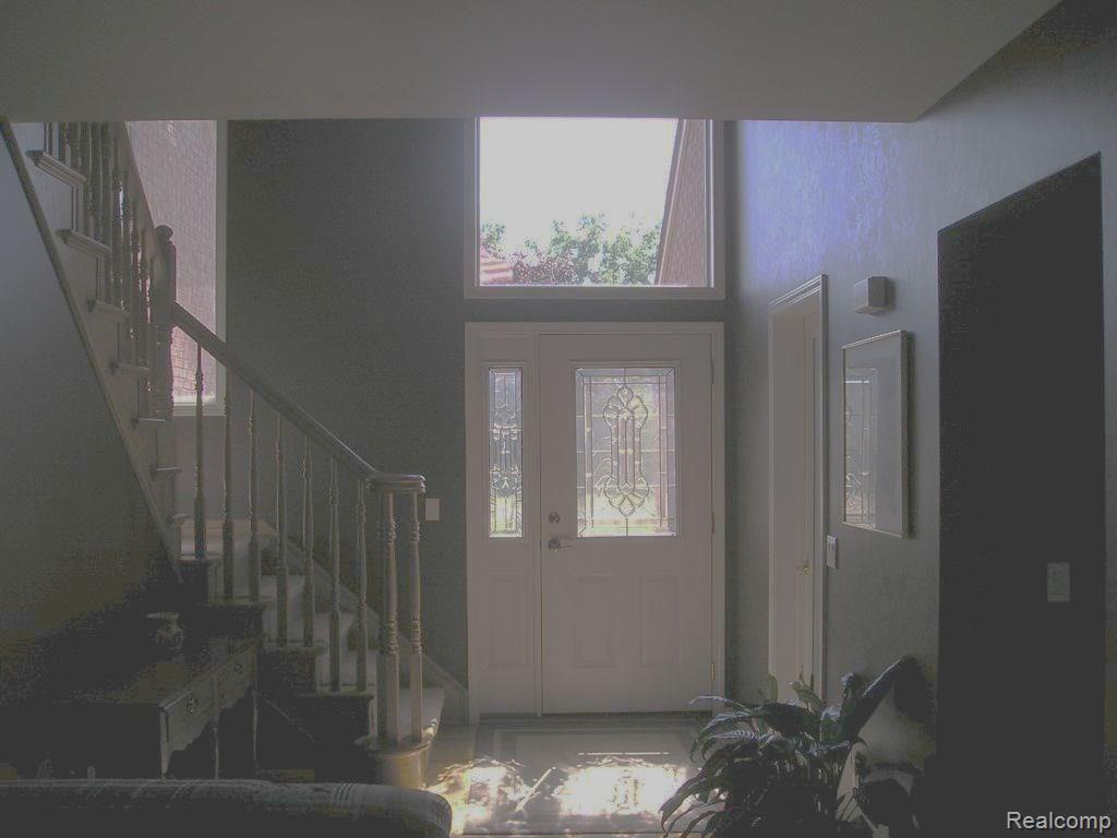 4025 Belle Ridge Drive Dryden, MI 48428 - Photo 34 of 43 Front door and foyer viewed from Great Room.