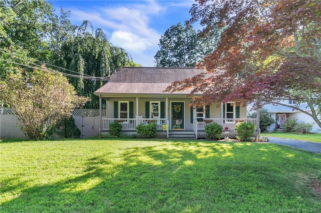 38 Booth Road Enfield, CT 06082 - Photo 1 of 1 a view of a house with a yard and sitting area