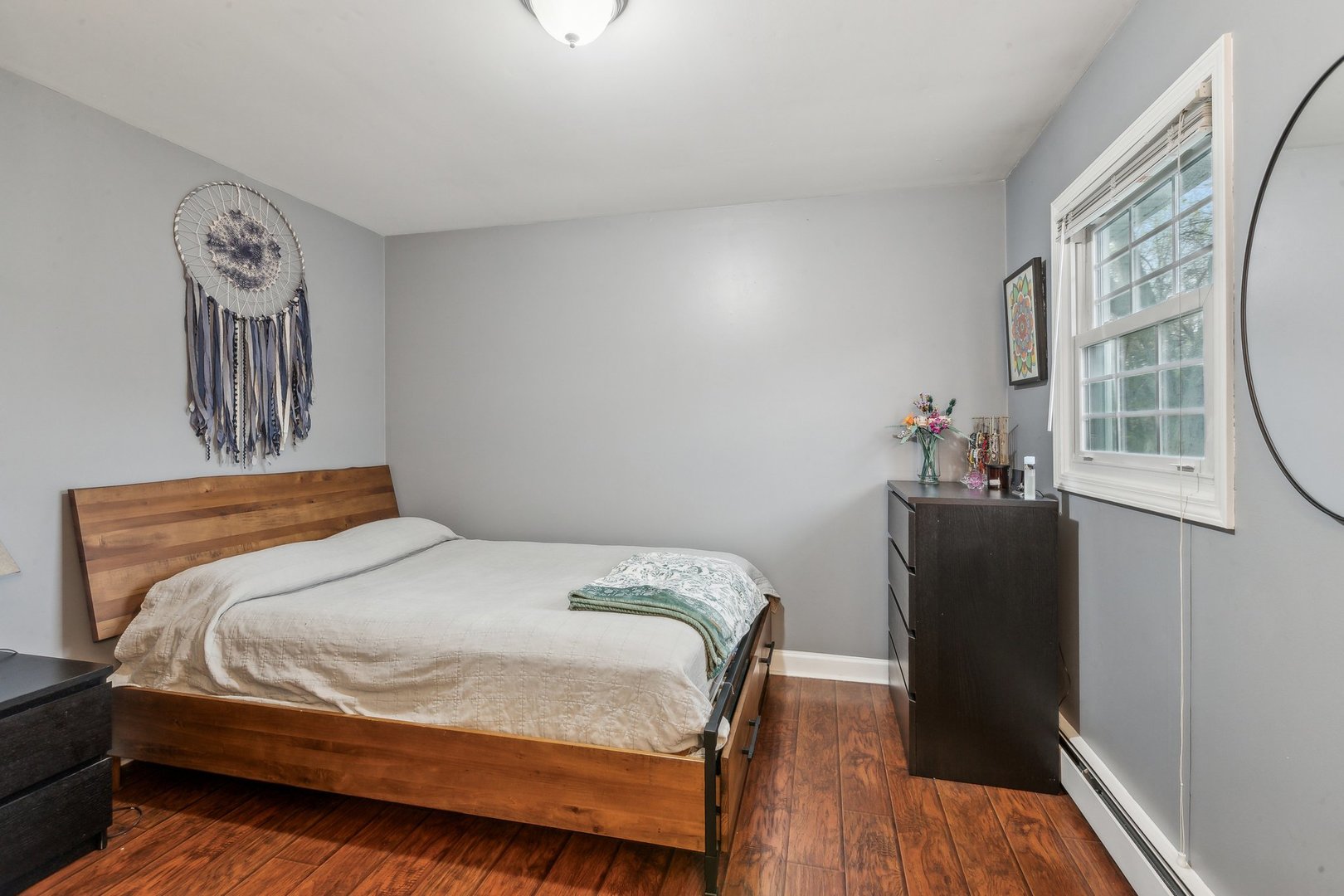 204 Oakleaf Road Lake In The Hills, IL 60156 - Photo 15 of 41 a bedroom with a bed and wooden floor