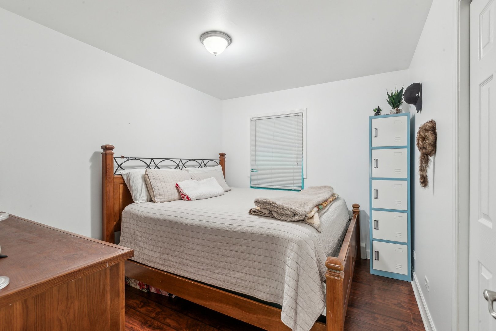 204 Oakleaf Road Lake In The Hills, IL 60156 - Photo 17 of 41 a bedroom with a bed and a table