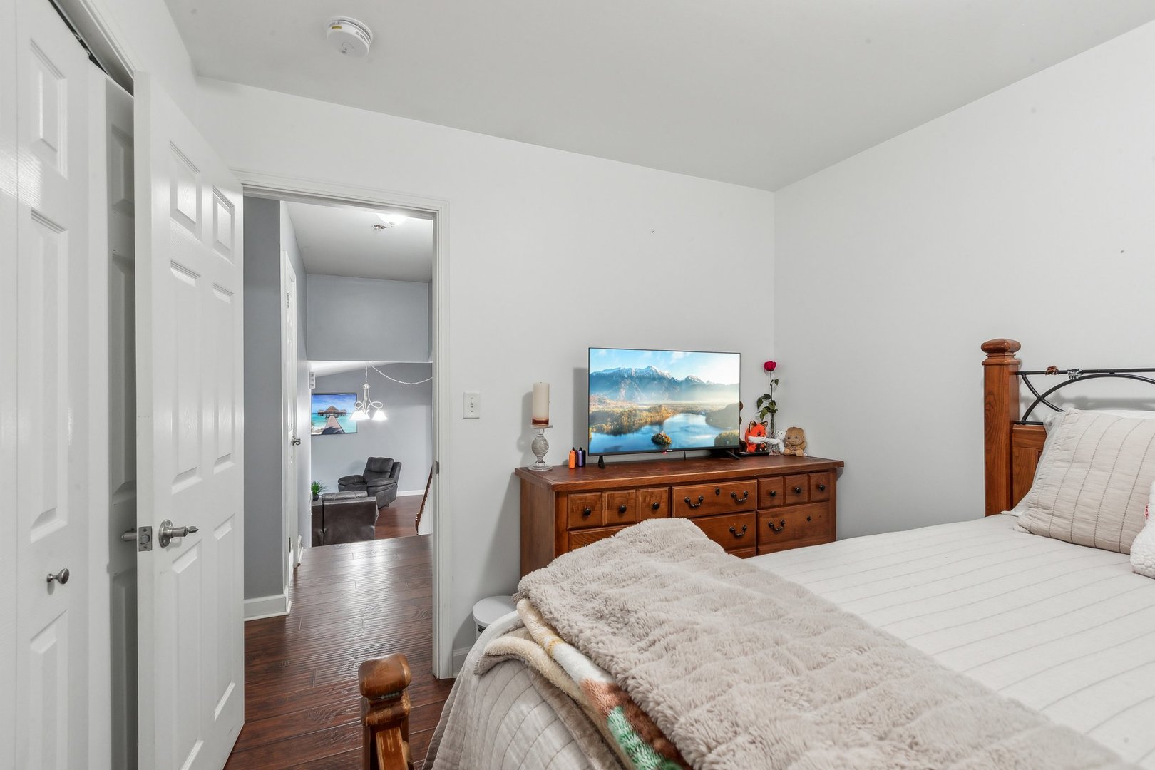 204 Oakleaf Road Lake In The Hills, IL 60156 - Photo 18 of 41 a bedroom with bed and wooden floor