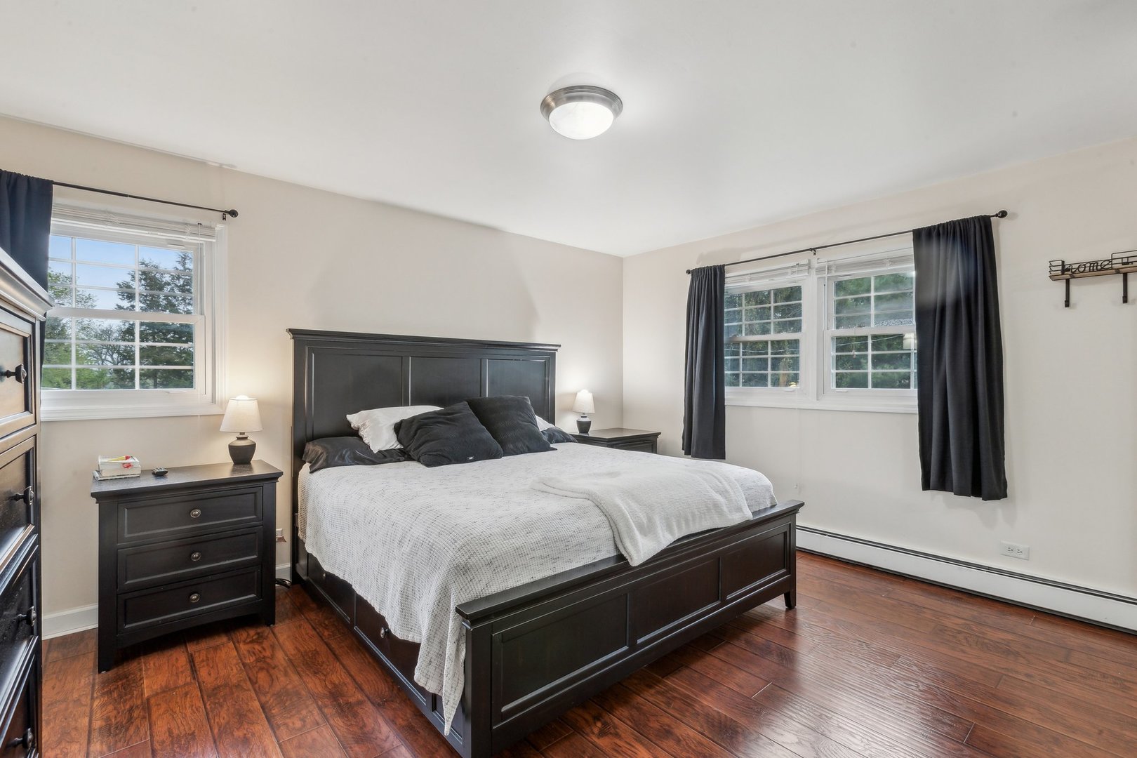 204 Oakleaf Road Lake In The Hills, IL 60156 - Photo 20 of 41 a bedroom with a bed and wooden floor