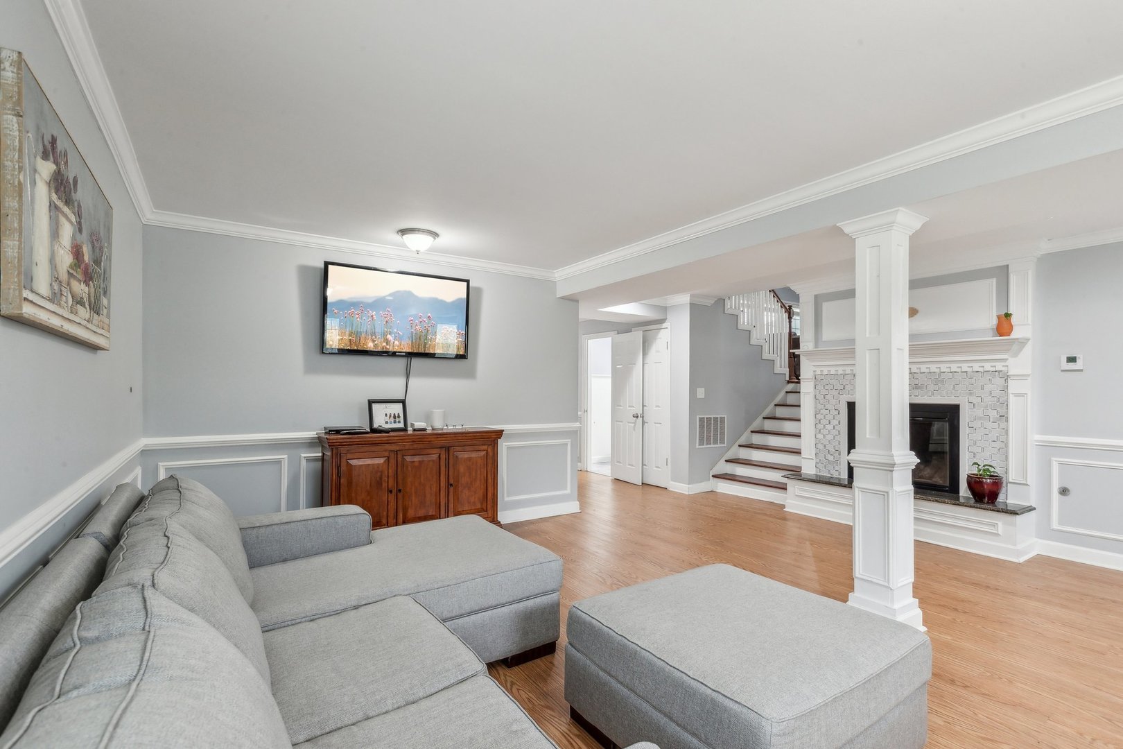 204 Oakleaf Road Lake In The Hills, IL 60156 - Photo 25 of 41 a living room with furniture and wooden floor