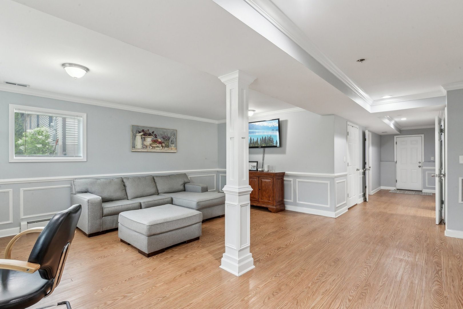 204 Oakleaf Road Lake In The Hills, IL 60156 - Photo 27 of 41 a living room with furniture and a wooden floor