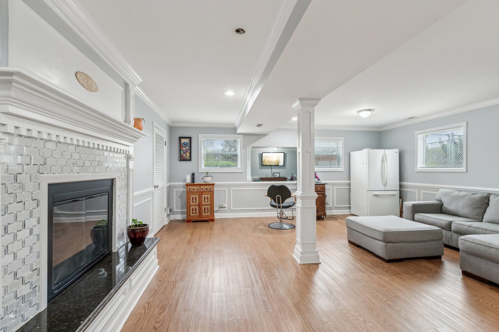204 Oakleaf Road Lake In The Hills, IL 60156 - Photo 28 of 41 a living room with furniture and a fireplace