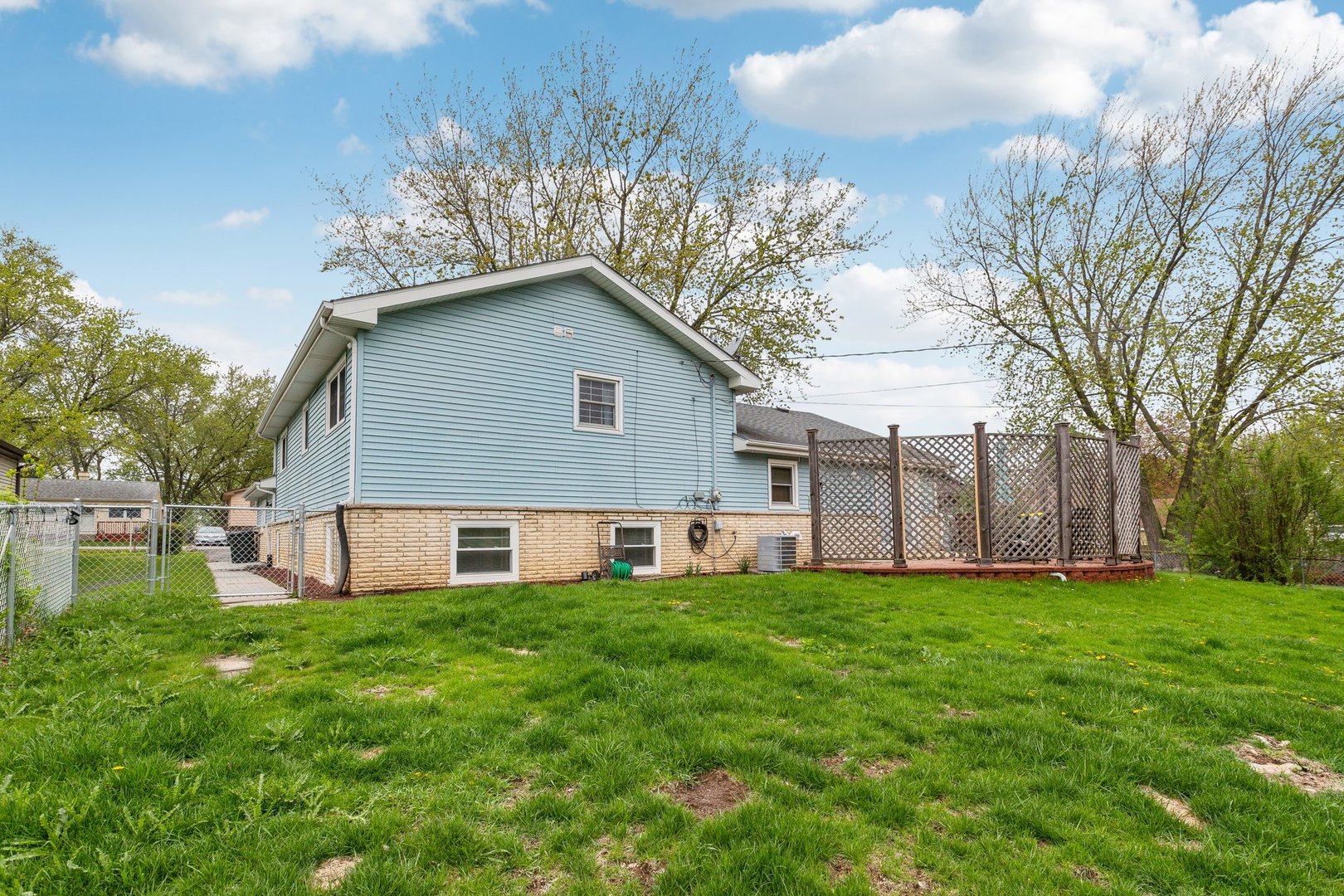 204 Oakleaf Road Lake In The Hills, IL 60156 - Photo 34 of 41 a view of a house with a yard