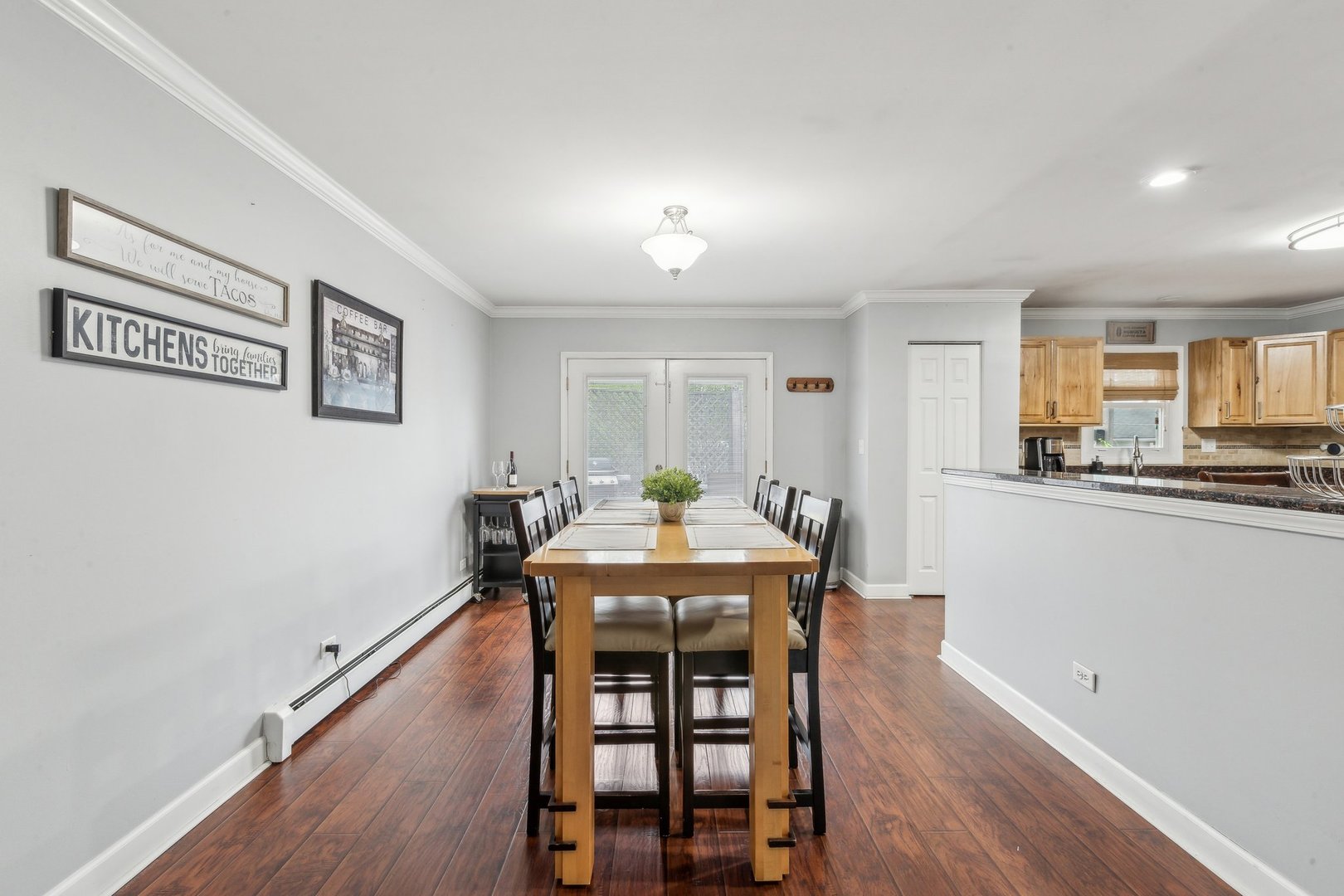 204 Oakleaf Road Lake In The Hills, IL 60156 - Photo 6 of 41 a view of a dining room with furniture and wooden floor