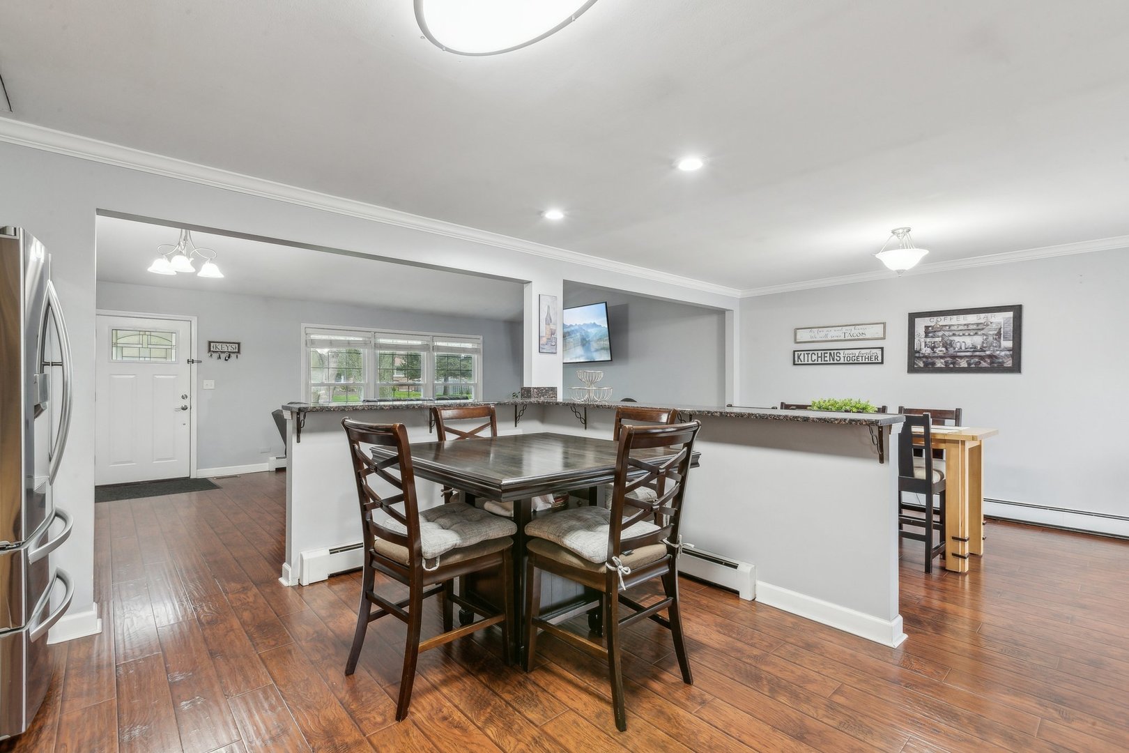 204 Oakleaf Road Lake In The Hills, IL 60156 - Photo 8 of 41 a view of a dining room with furniture and wooden floor