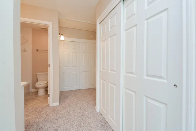 a view of a bathroom with a toilet
