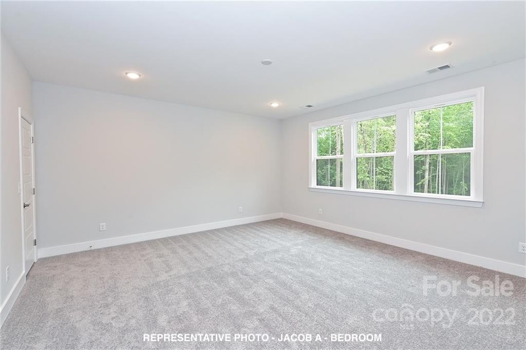 366 Meek Road Gastonia, NC 28056 - Photo 21 of 24 an empty room with windows