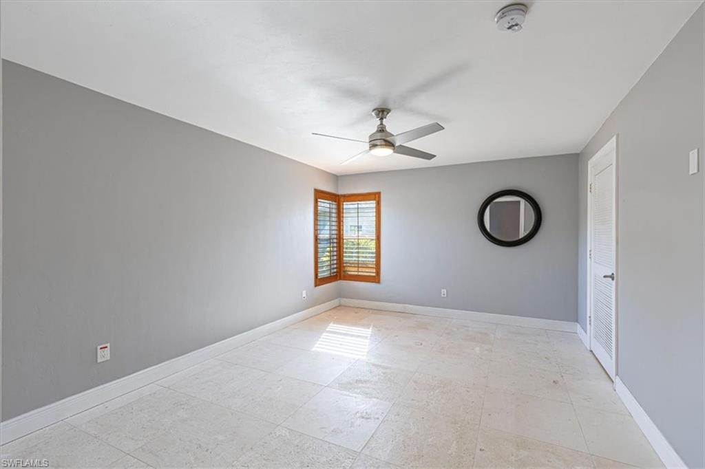 4590 Eagle Key Circle Naples, FL 34112 - Photo 14 of 37 Primary bedroom