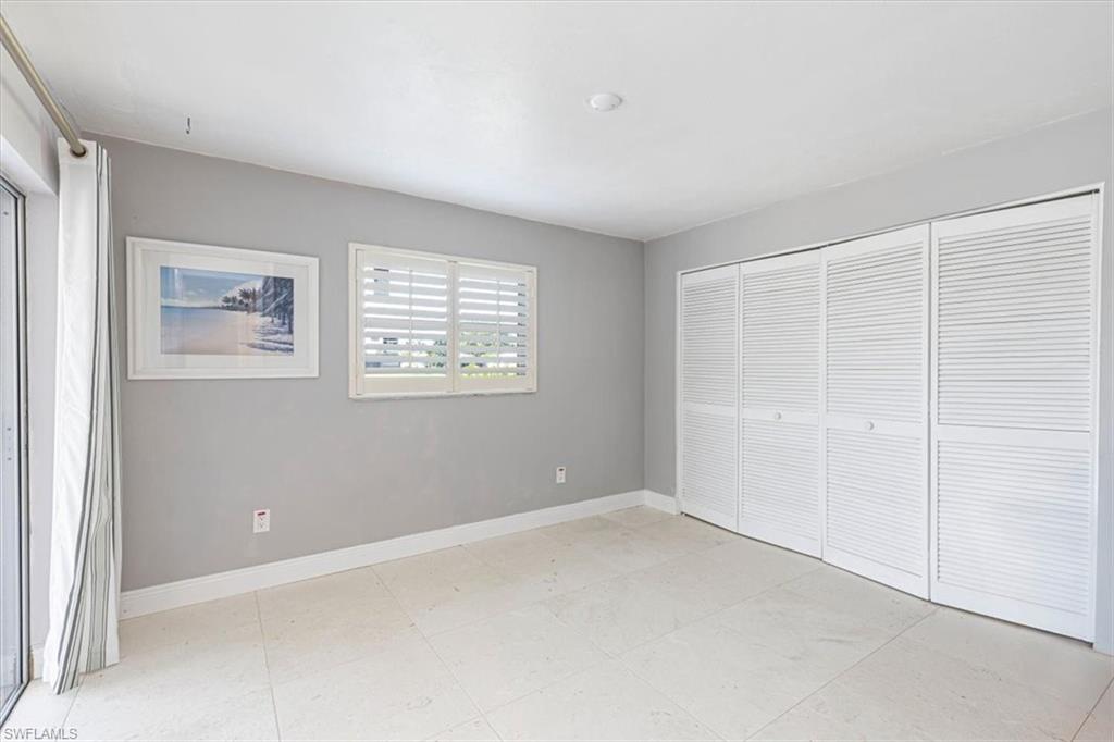 4590 Eagle Key Circle Naples, FL 34112 - Photo 23 of 37 Seperate laundry room with sink