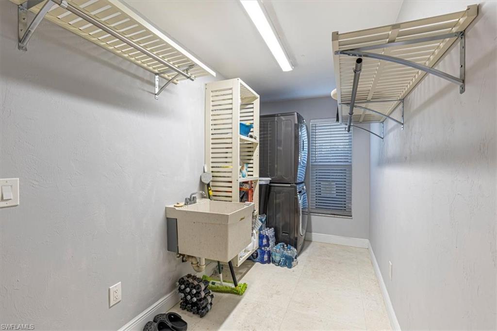 4590 Eagle Key Circle Naples, FL 34112 - Photo 24 of 37 Seperate laundry room with sink