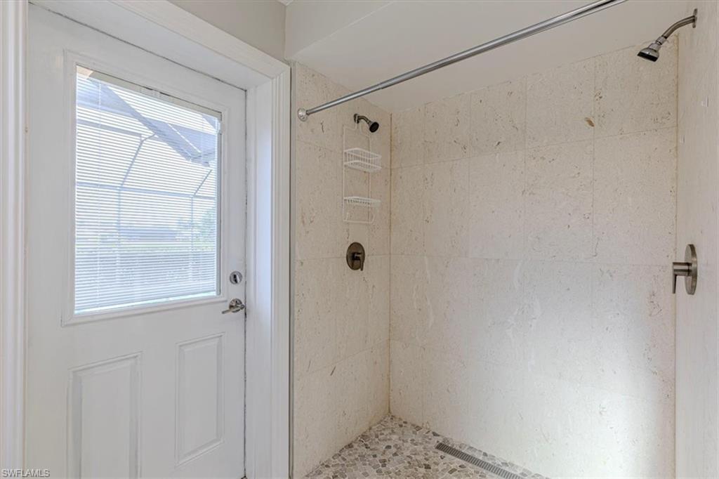 4590 Eagle Key Circle Naples, FL 34112 - Photo 25 of 37 Full bath with tiled shower