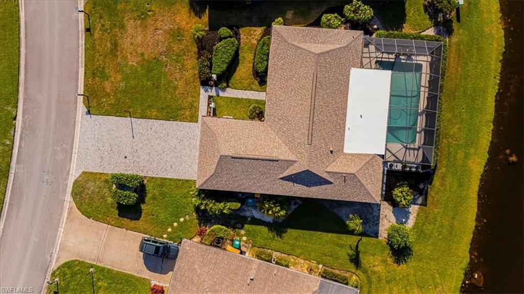 4590 Eagle Key Circle Naples, FL 34112 - Photo 35 of 37 Bird's eye view of a pool area