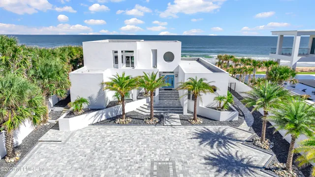 a view of a livingroom with furniture staircase and a living room