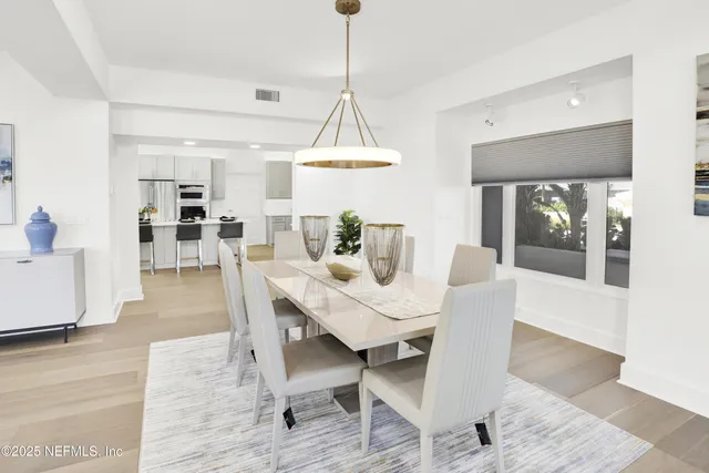 a stove top oven sitting inside of a kitchen