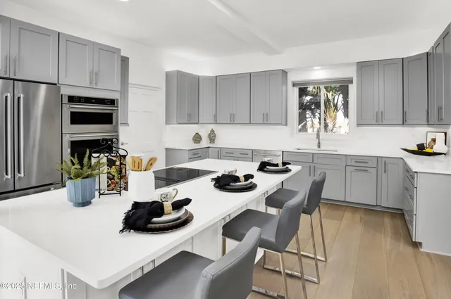 a bathroom with a tub and shower