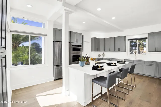 a view of a backyard of the house