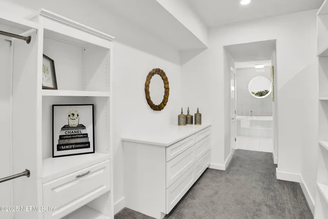 a view of a swimming pool with seating area