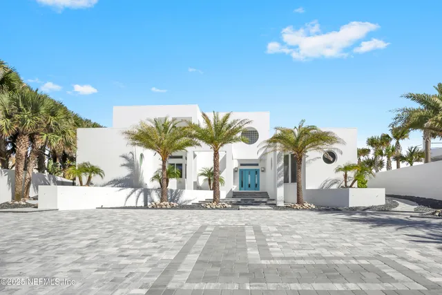 a view of a backyard of a house