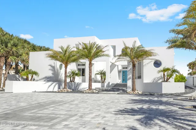 a view of a street with a building in the background