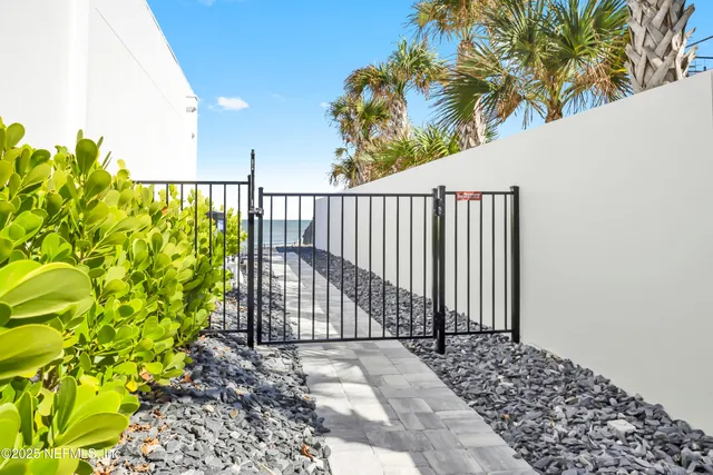 aerial view of a house with a garden and plants