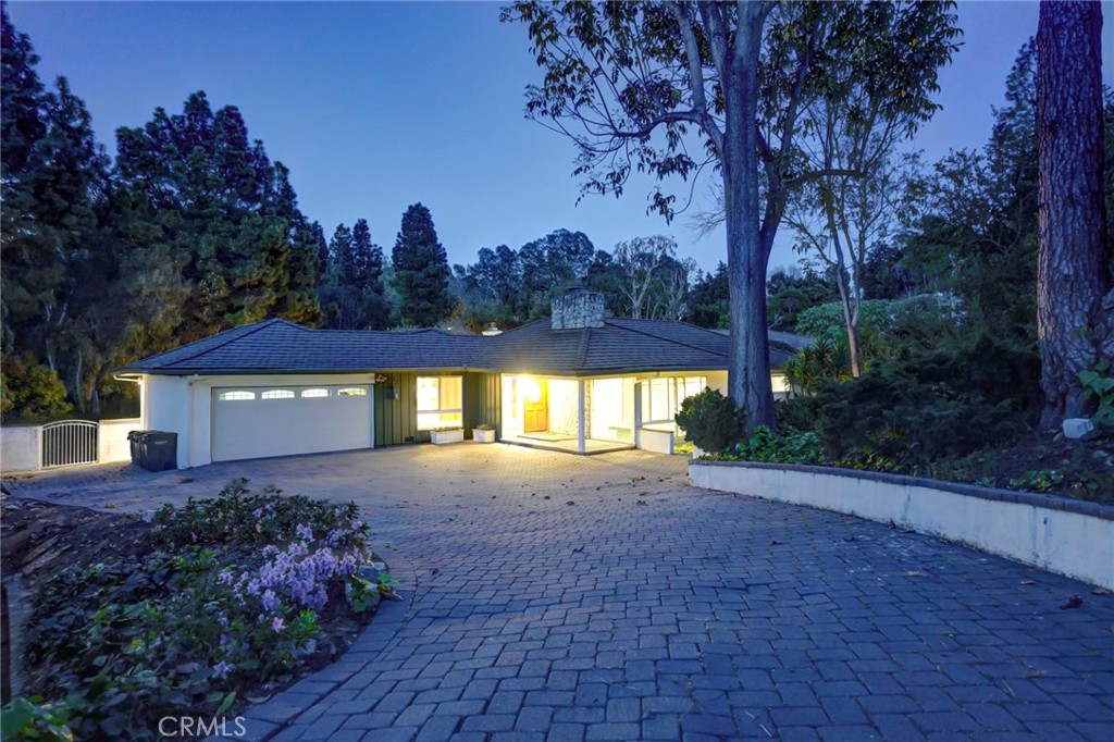 5205 Middlecrest Road Rancho Palos Verdes, CA 90275 - Photo 3 of 36 a view of a house with a yard and tree s