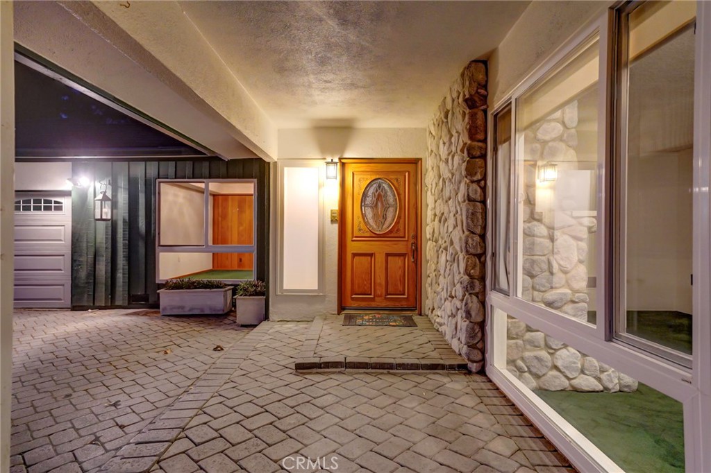 5205 Middlecrest Road Rancho Palos Verdes, CA 90275 - Photo 5 of 36 a spacious bedroom with a bed and a large window