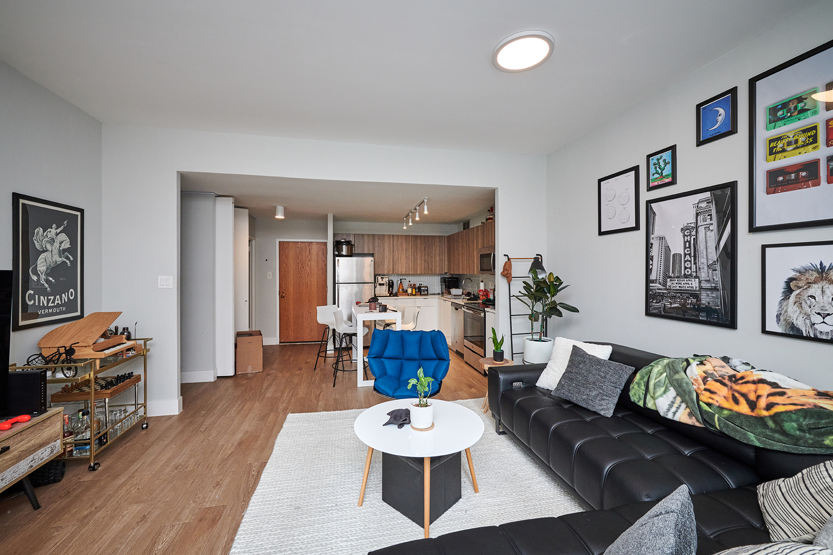 211 East Ohio Street, Unit 614 Chicago, IL 60611 - Photo 6 of 21 a living room with furniture and a wooden floor