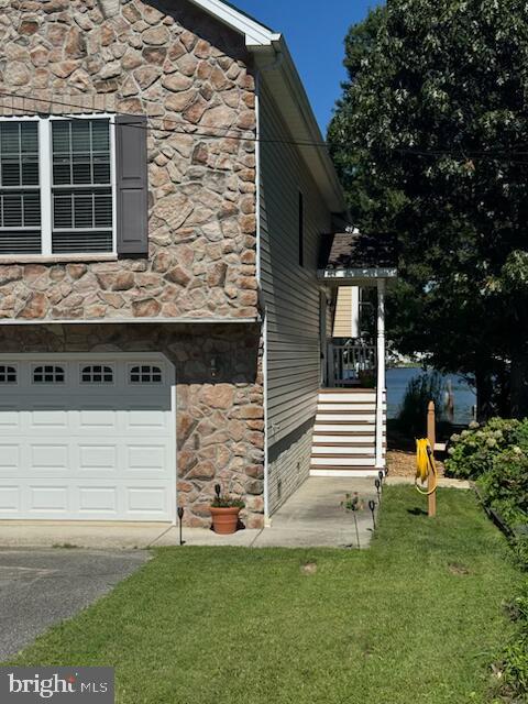 3816 Chestnut Road Baltimore, MD 21220 - Photo 11 of 27 a front view of a house with a garden