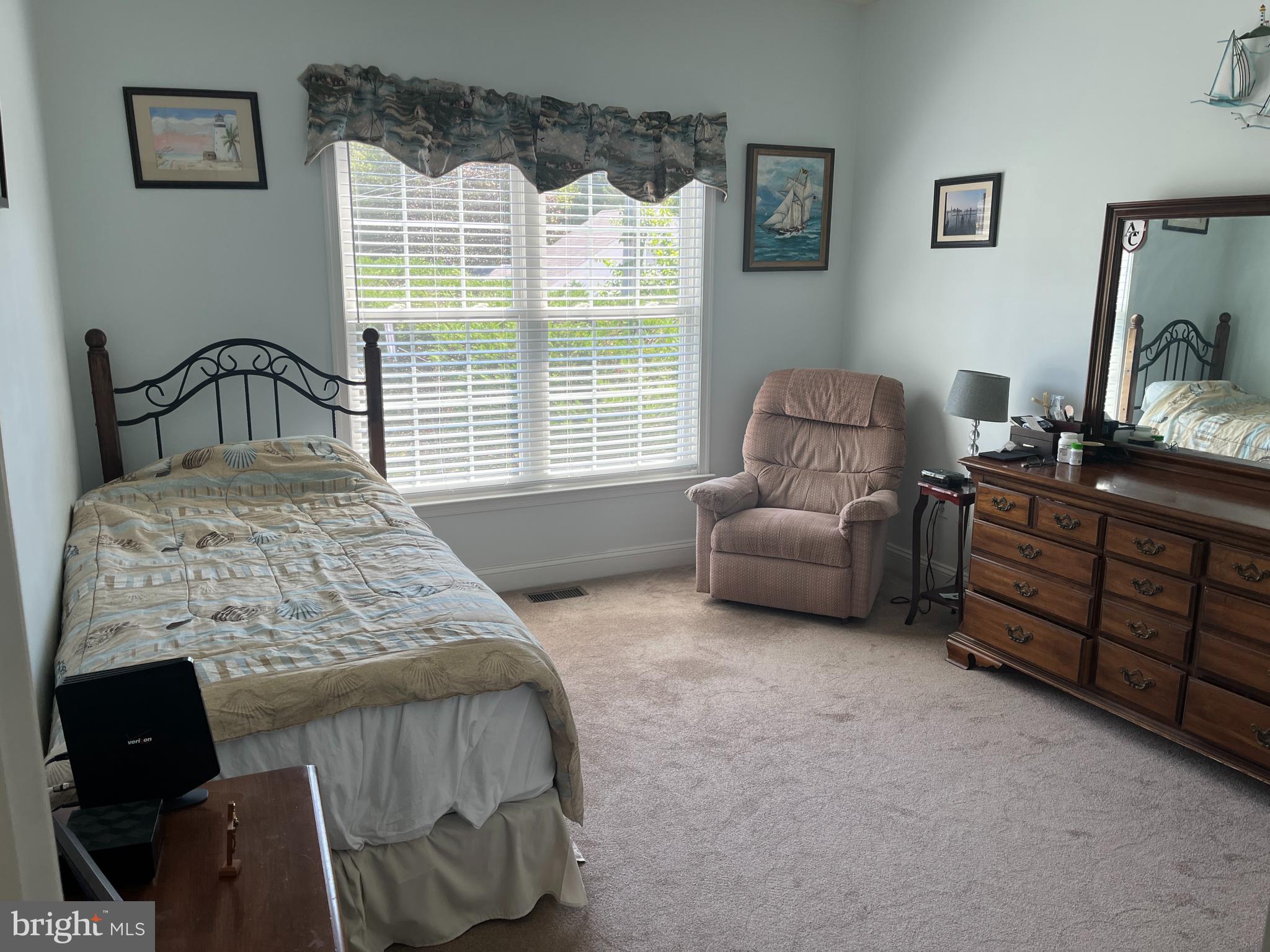 3816 Chestnut Road Baltimore, MD 21220 - Photo 20 of 27 a bedroom with a bed and a couch