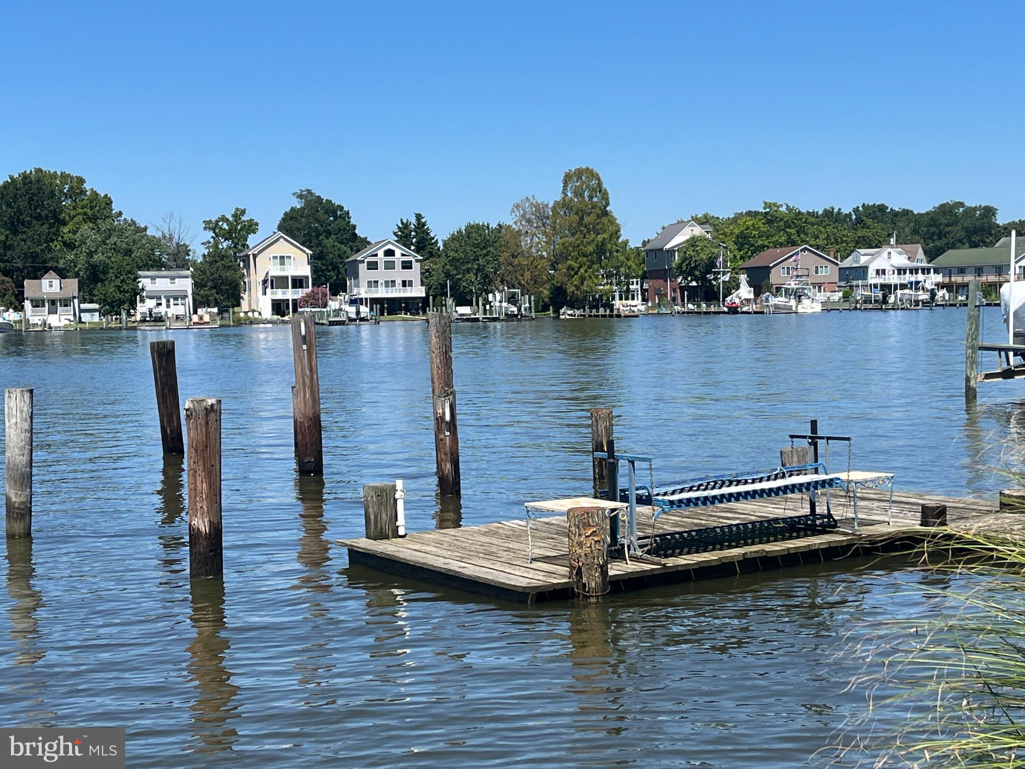 3816 Chestnut Road Baltimore, MD 21220 - Photo 6 of 27 a view of a lake with boats and trees in the background
